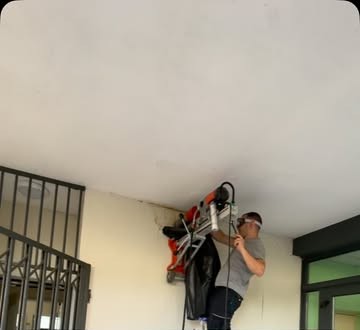 Carottage d’un mur en béton armé à la carotteuse diamant